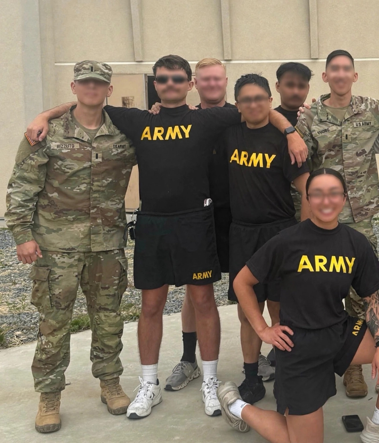 Anthony Rizzuto Jr. in Army uniform posing with fellow soldiers